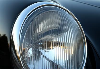 Close-up of a restored, crystal clear headlight